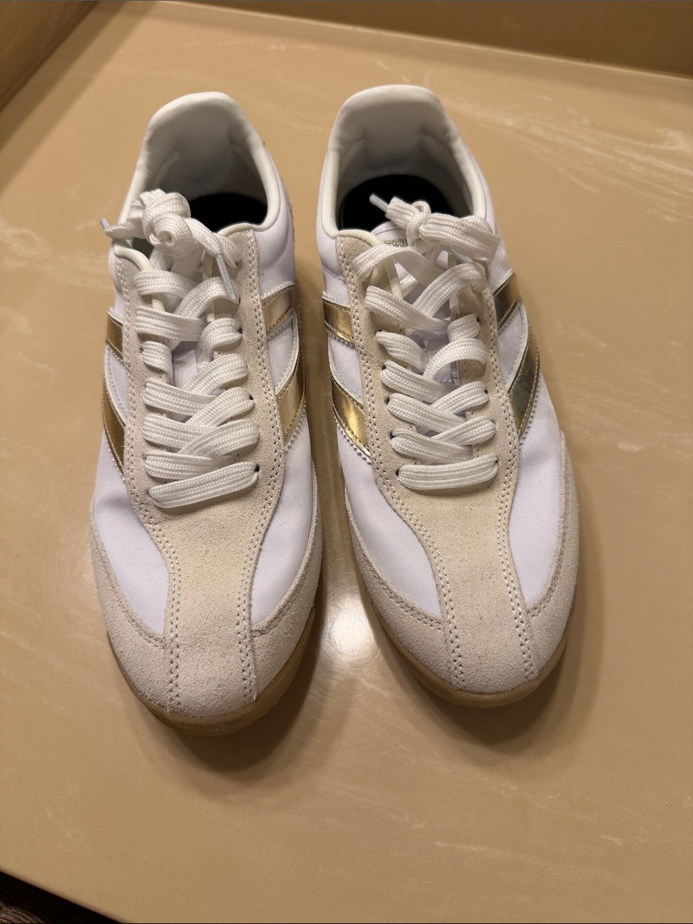Tretorn White Sneakers with Gold Stripes